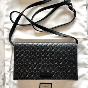 Gucci Microguccissima crossbody clutch wallet